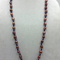 Past Work.  Rope of mauve pearls & lapis lazuli on navy silk. Sold