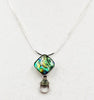Sterling silver, abalone, and peridot pendant necklace.