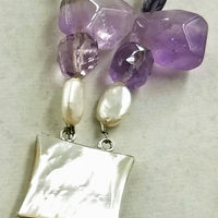 Wild, bold, gorgeous, two-strand amethyst, pearl, shell, & sterling silver necklace. If interested, please contact us.