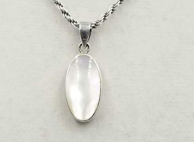 A pretty Sterling Silver chain with Mother of Pearl pendant.  20