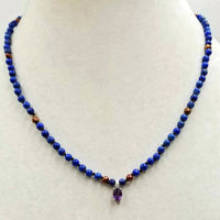 Stunning! Made for a Queen. Lapis Lazuli & Cranberry pearls on chocolate silk. 14KWG with a 10KWG amethyst & diamond pendant.