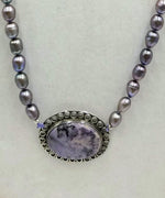 Baroque peacock pearls, sterling silver & sugilite pendant, hand-knotted necklace on lilac silk.  35" Length.