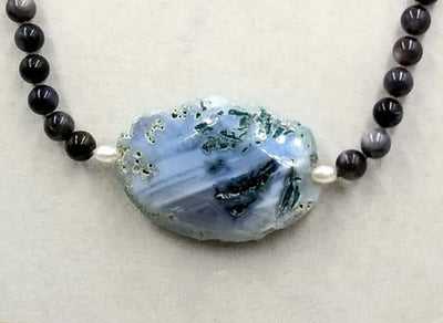Stunningly gorgous sterling silver, Mother of Pearl & blue agate necklace on coppertone silk.  25.25