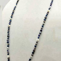 Multicolor freshwater cultured pearls on sky blue silk, rope necklace. 36" Length.