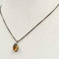 Pretty! Sterling silver chain with a Baltic amber pendant necklace. 16" Length. Vegan.