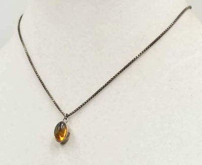 Pretty! Sterling silver chain with a Baltic amber pendant necklace. 16
