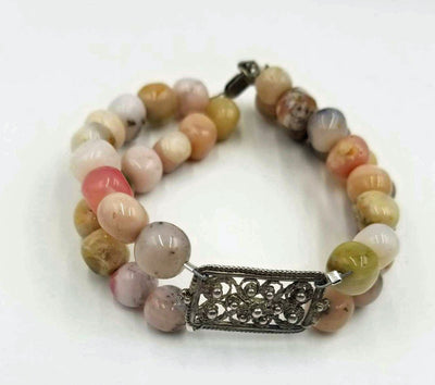 Beautiful and classic, 2-strand pink opal bracelet with sterling silver accents. A gift for yourself?  8.25