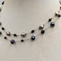 So delicate & sweet. Two-strand choker made with Swarovski elements, sterling silver & pearls.  15.5" length.