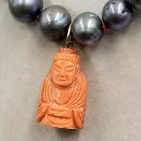 14K Yellow Gold,  peacock pearl & carved coral buddha pendant necklace, hand-knotted with crimson silk. 19.25 inch length.