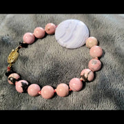 Vermeil rhodonite, blue lace agate, and onyx bracelet.