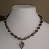 Sterling silver, tiger's eye, and black pearl Victorian floral necklace bracelet set.