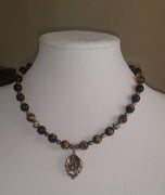 Sterling silver, tiger's eye, and black pearl Victorian floral necklace bracelet set.