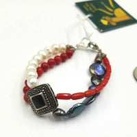 Pathways 2-strand coral, pearl, onyx, and sterling silver bracelet.