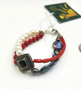 Pathways 2-strand coral, pearl, onyx, and sterling silver bracelet.