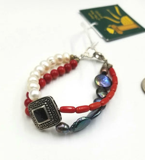 Pathways 2-strand coral, pearl, onyx, and sterling silver bracelet.