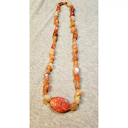 Vintage carnelian with sponge coral focal.