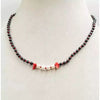 Vampire's Kiss hematite, pearl, coral, and sterling silver adjustable necklace.