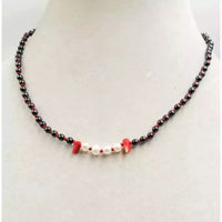 Vampire's Kiss hematite, pearl, coral, and sterling silver adjustable necklace.