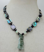 Sterling garnet, abalone, and carved jadeite "bamboo" pendant necklace.