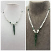 Serene moonstone, vintage jade, and 14kyg lucky horn pendant necklace.