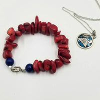 Bold red coral and lapis sterling silver bracelet. Super vibrant!