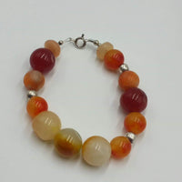 Vegan-wear. Carnelian, agate, jadeite, sunstone, sterling silver, bracelet.  6.5" length.