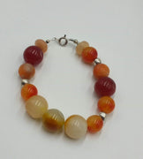 Vegan-wear. Carnelian, agate, jadeite, sunstone, sterling silver, bracelet.  6.5" length.