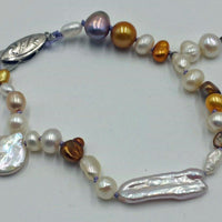 Vintage, silver, multi-colored baroque pearl, lavender silk, bracelet. Very pretty.