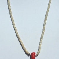 Wow, a bold statement piece. Sterling silver, heishi shell & bold coral pendant necklace.  27" length.