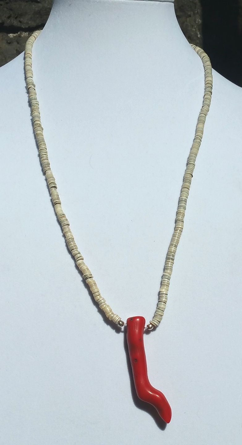 Wow, a bold statement piece. Sterling silver, heishi shell & bold coral pendant necklace.  27" length.