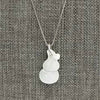 Nearly white celadon jadeite pendant shaped like a gourd. Sterling silver chain.