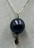 Sterling silver, black Tahitian pearl pendant necklace.