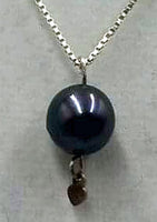 Sterling silver, black Tahitian pearl pendant necklace.