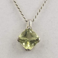 Beautiful, lemon citrine pendant on a sterling silver necklace.  17" Princess length. Vegan.