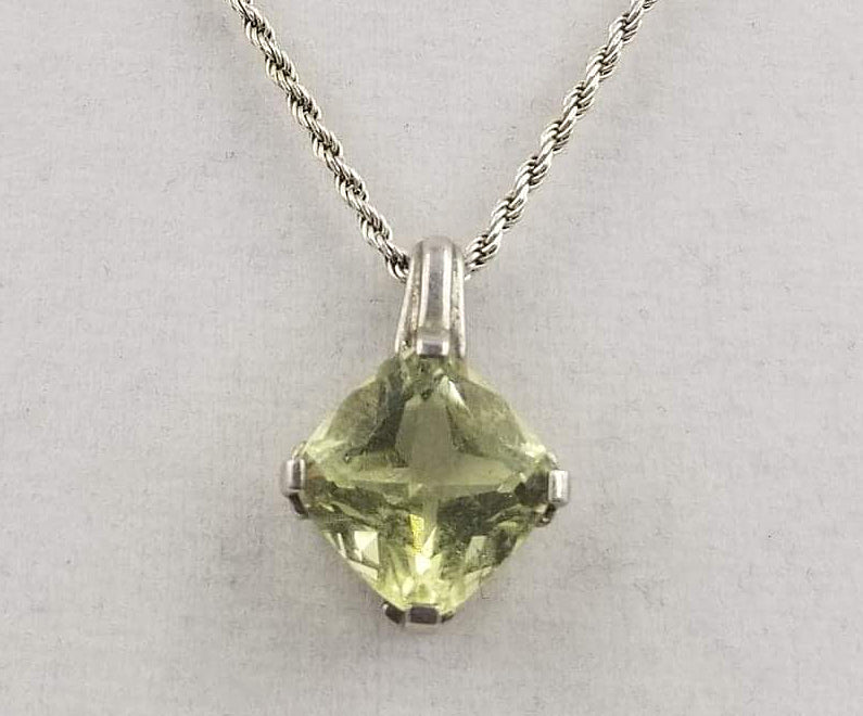 Beautiful, lemon citrine pendant on a sterling silver necklace.  17" Princess length. Vegan.
