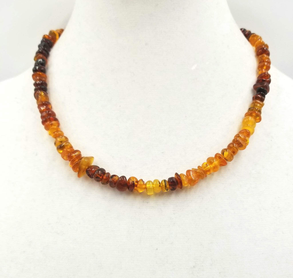 Past Work. Strand of variegated honey, cognac, brandy, & butterscotch Baltic amber with Sterling silver. 19" Princess length Sold.