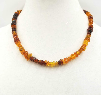 Past Work. Strand of variegated honey, cognac, brandy, & butterscotch Baltic amber with Sterling silver. 19