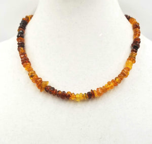 Past Work. Strand of variegated honey, cognac, brandy, & butterscotch Baltic amber with Sterling silver. 19" Princess length Sold.