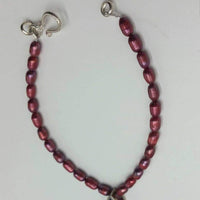 Sterling, pearl, & garnet bracelet.