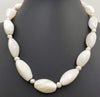 Vintage, white agate, pearl necklace on chocolate silk with sterling gold wash clasp. 19" Princess Length.