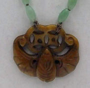Rope length, ombre, jadeite necklace with bowenite bat pendant on chocolate silk.