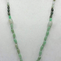 Rope length, ombre, jadeite necklace with vintage nephrite bat pendant on chocolate silk.