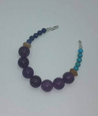 PRICE REDUCED Sterling, lapis, turquoise, moonstone, sunstone, purple agate bracelet. 7