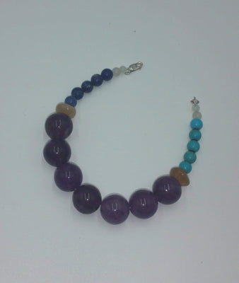 Sterling, lapis, turquoise, moonstone, sunstone, purple agate bracelet. 7