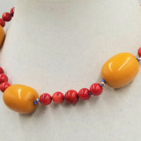 Unusual & Bold. 14KYG, coral and bold faturan choker, white silk. 17.5" length.