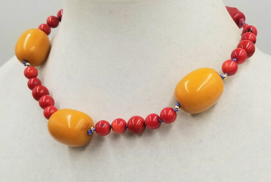 Unusual & Bold. 14KYG, coral and bold faturan choker, white silk. 17.5" length.