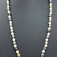 Opera length. Fine, multi-color, pearls, individually knotted on grey silk with 14KYG clasp.