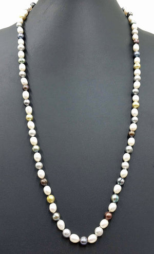 Opera length. Fine, multi-color, pearls, individually knotted on grey silk with 14KYG clasp.