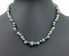 2-tone jadeite & black pearl, sterling silver, necklace on navy silk. 17.5-19" Princess length.