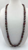 "Burnt Prayers." PRICE REDUCED Very rare binghamite & antique carved red nephrite mala necklace on green silk.